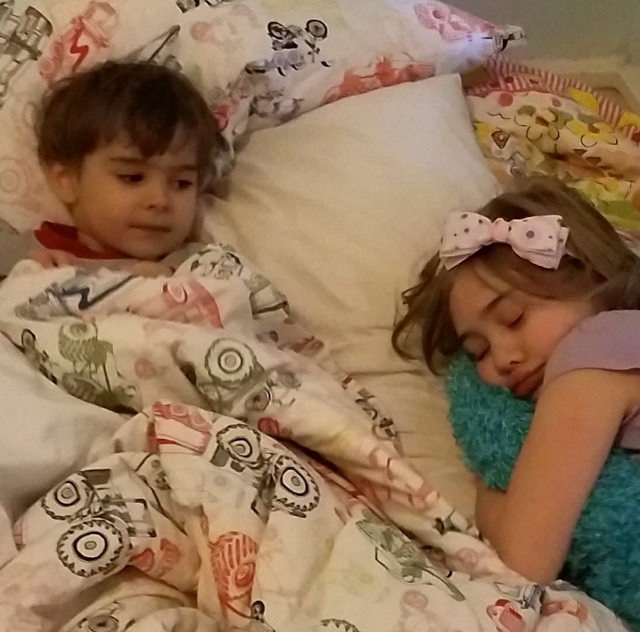 She fell asleep trying to put him to sleep.